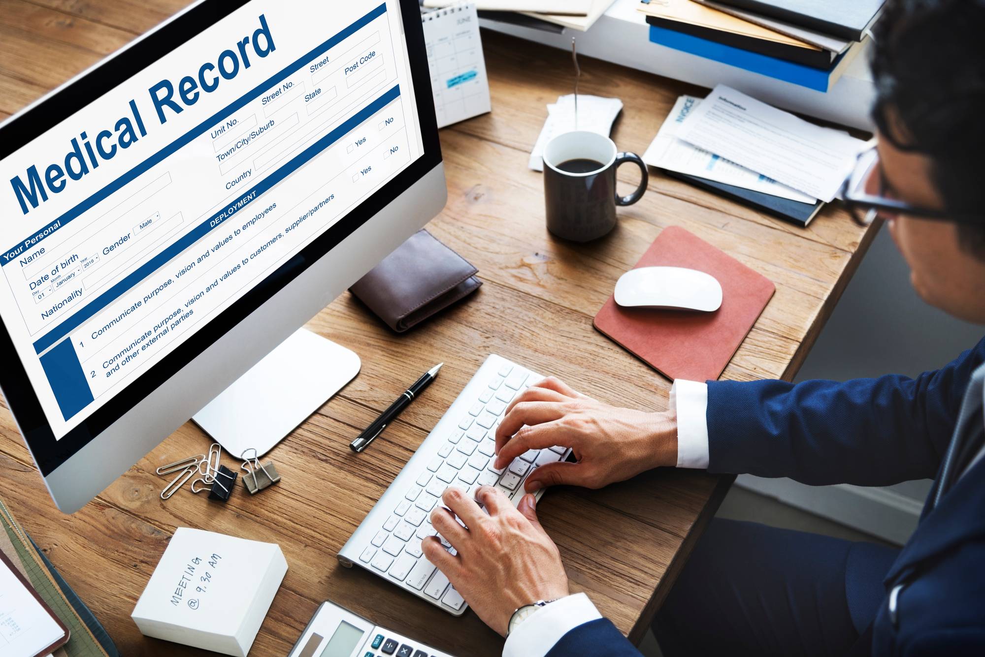 Doctor sending medical records regarding the Harbottle Surgery data breach group action open claim