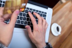 person paying with Mastercard regarding the class action lawsuit moving forward