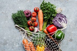 Vegetables in a mesh grocery bag