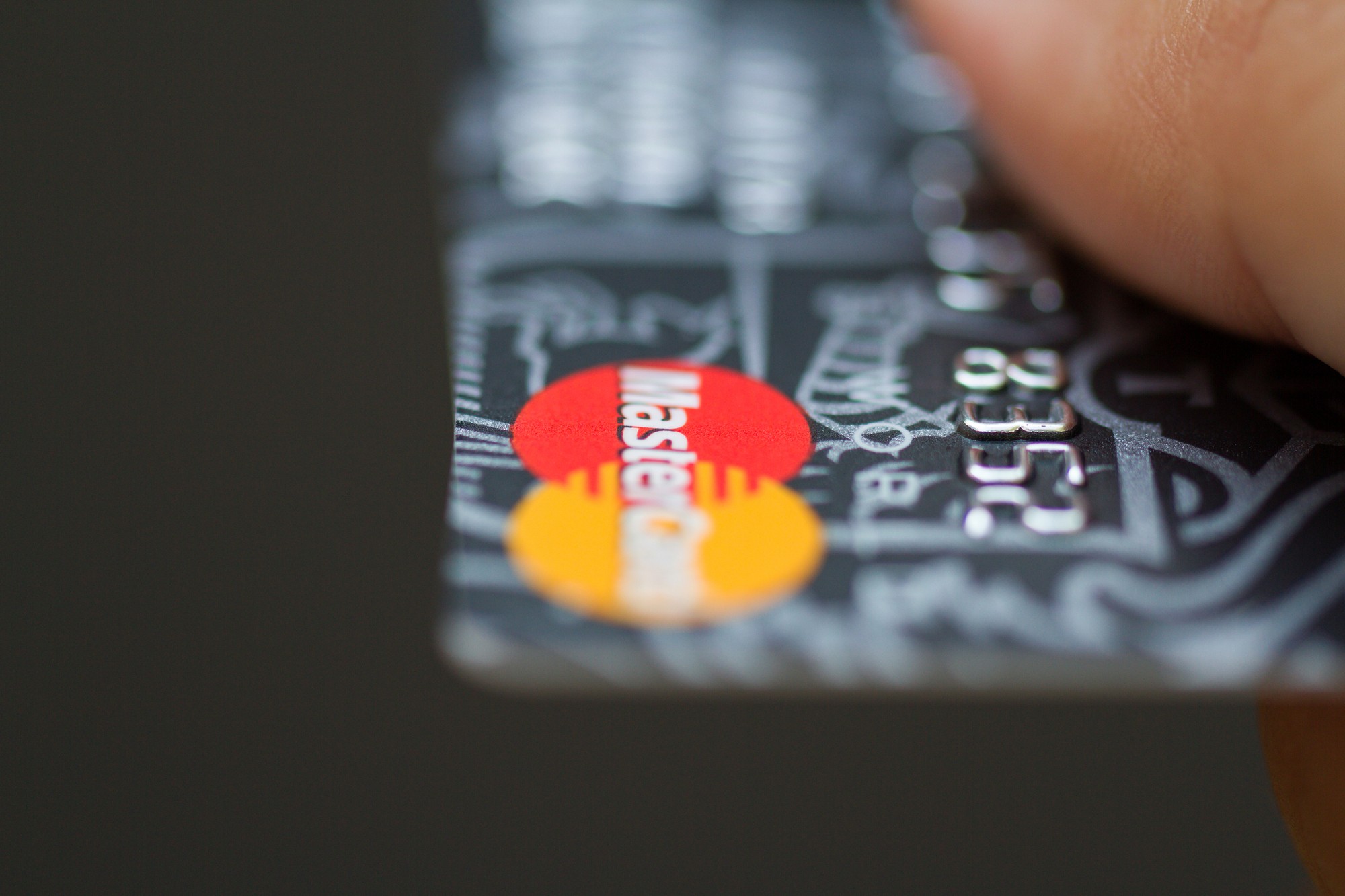 Cropped shot of mastercard regarding the class action lawsuit moving forward