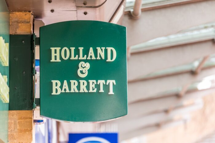 Holland and Barrett logo sign in Daventry town centre