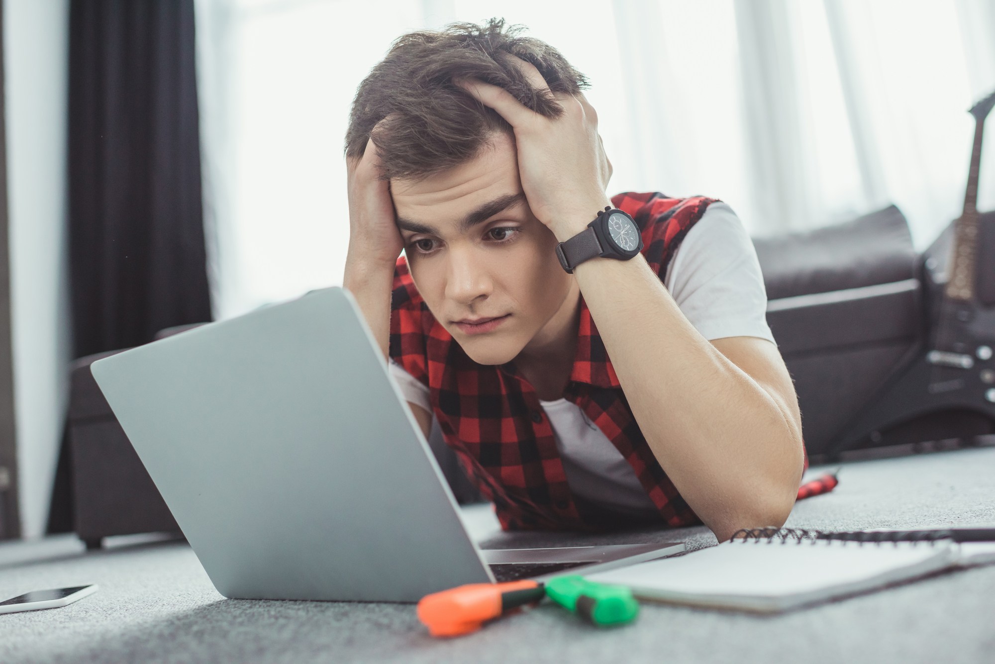 Student upset on laptop regarding the Northumbria University cyberattack